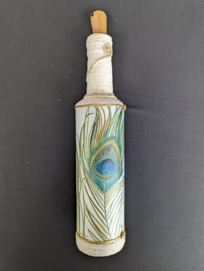 Decorated Illuminated Bottle with Peacock Feathers